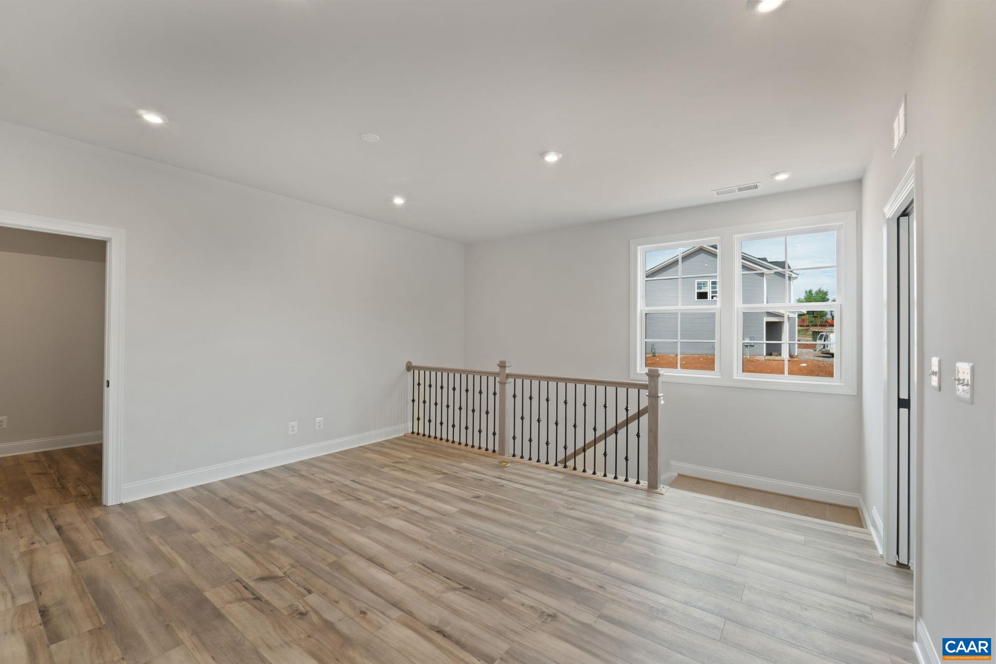 81 Springdale Road Waynesboro, VA 22980 - Photo 22 of 42 a view of a hallway with wooden floor