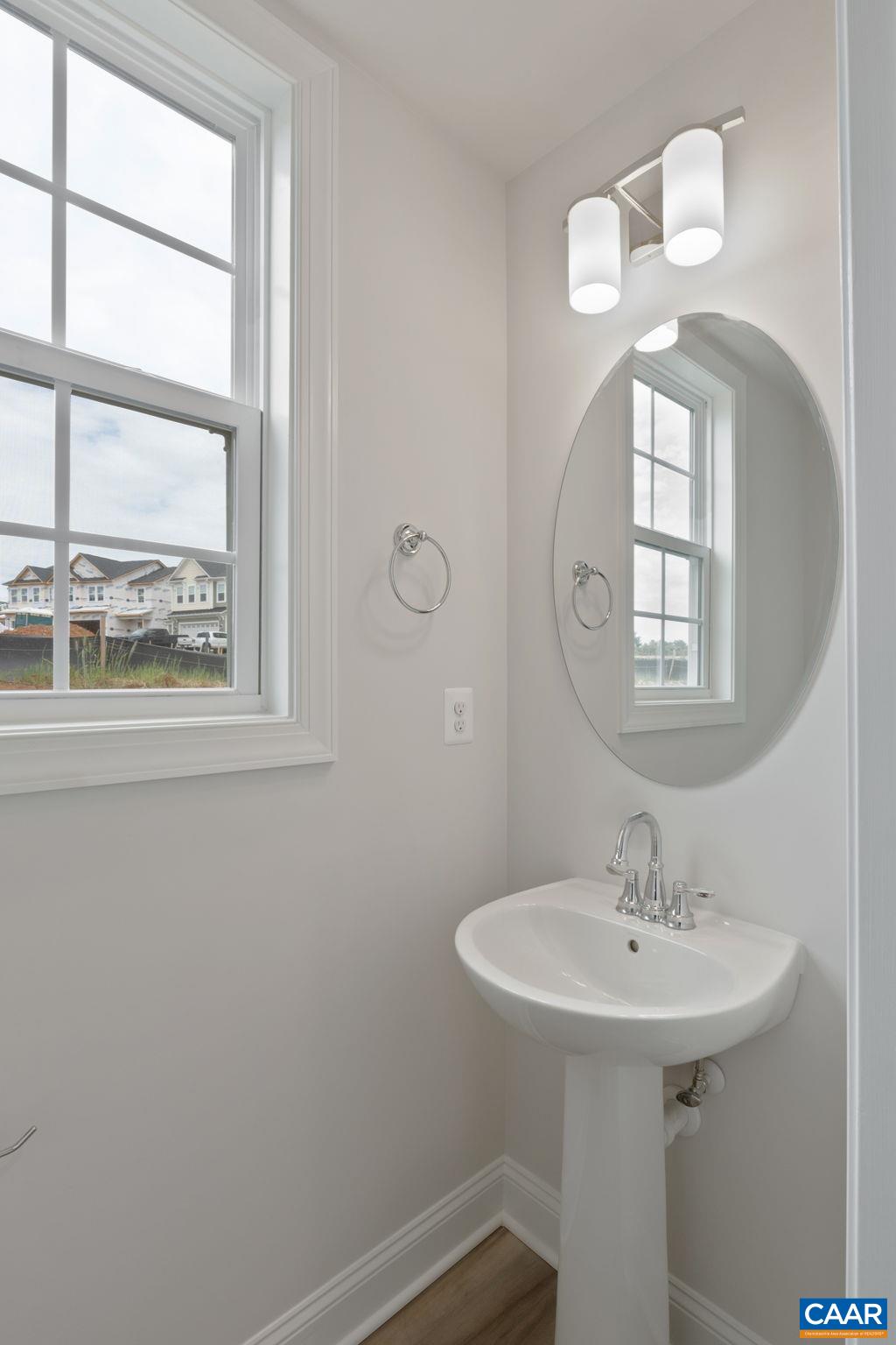 81 Springdale Road Waynesboro, VA 22980 - Photo 5 of 42 a bathroom with a sink a mirror and a window