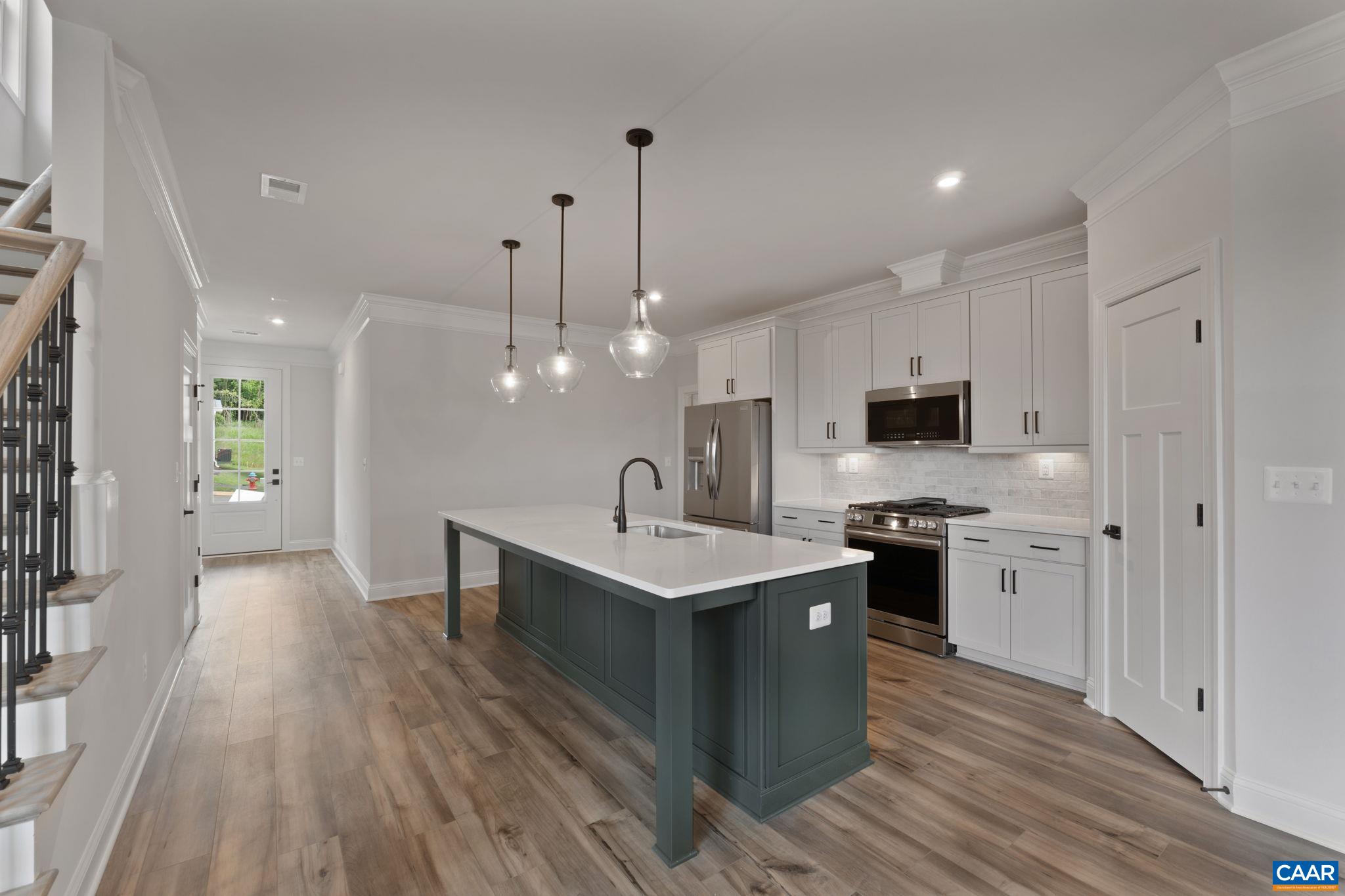 81 Springdale Road Waynesboro, VA 22980 - Photo 10 of 42 a kitchen with stainless steel appliances a stove sink and refrigerator