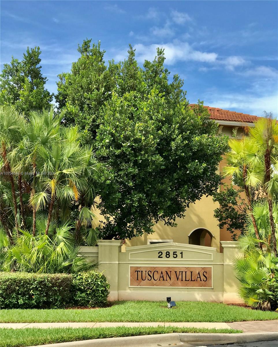 a sign on the side of a road