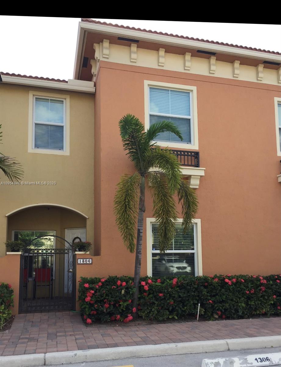 2851 Prospect Road, Unit 1306 Tamarac, FL 33309 - Photo 15 of 15 a view of a house with a yard