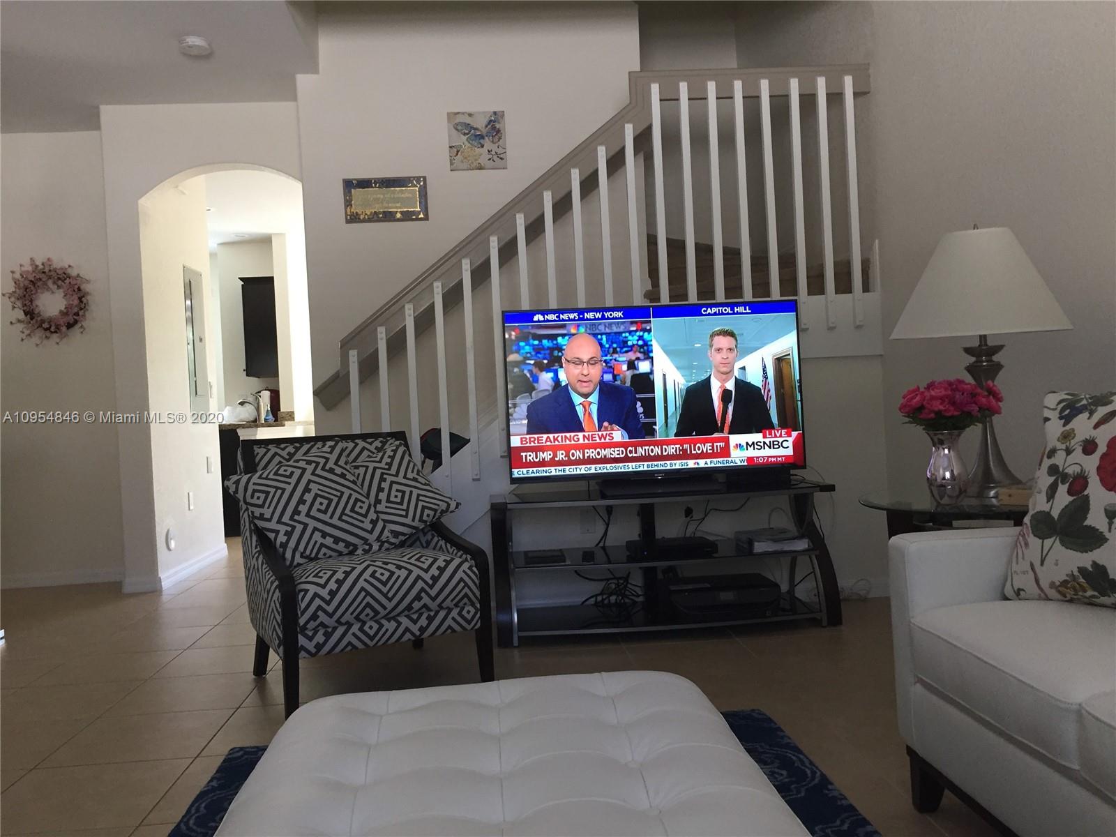 2851 Prospect Road, Unit 1306 Tamarac, FL 33309 - Photo 4 of 15 a bedroom with furniture and a window