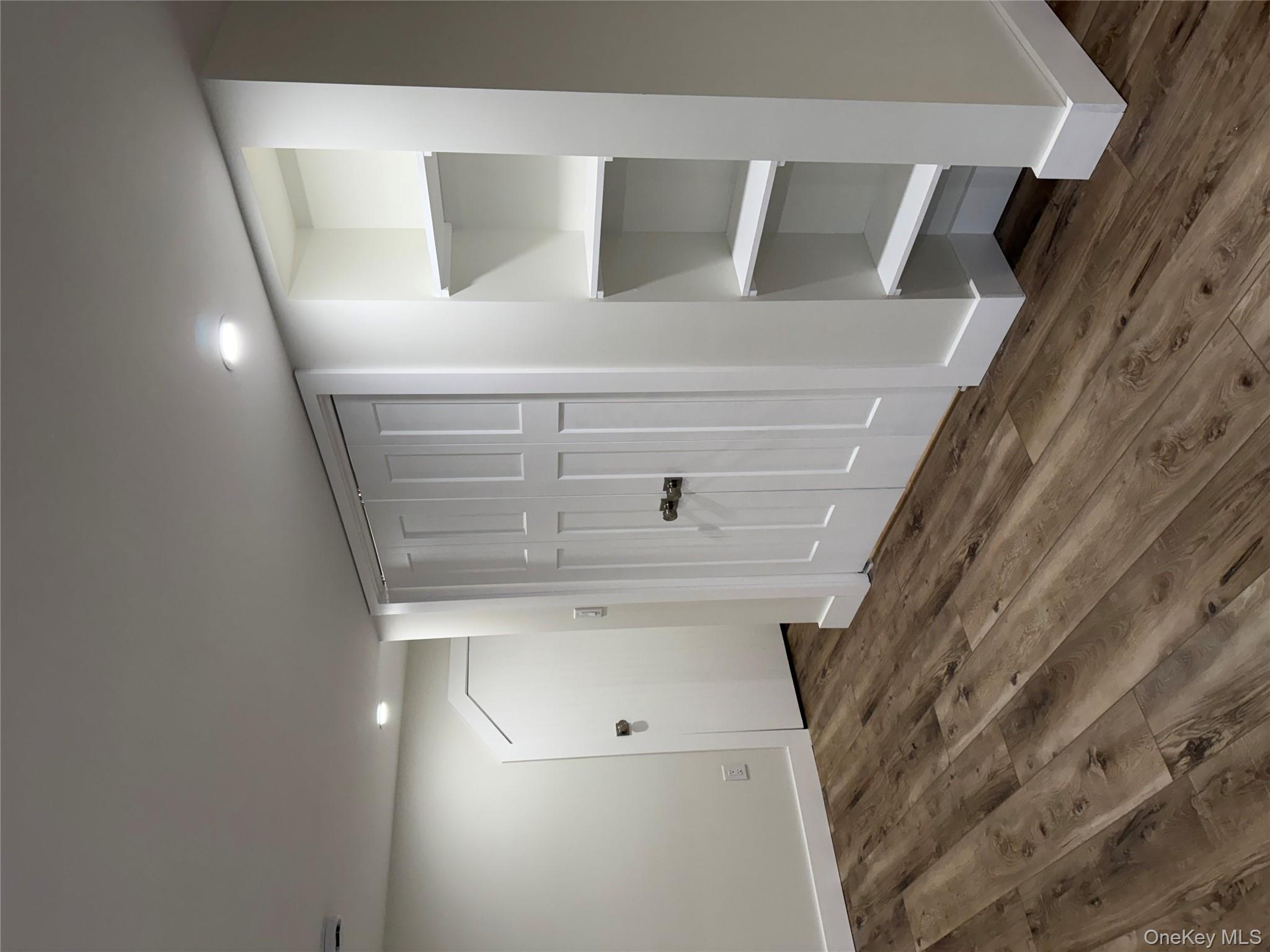 32 Ketchum Road, Unit BSMT Warwick, NY 10990 - Photo 4 of 15 Back view of living room