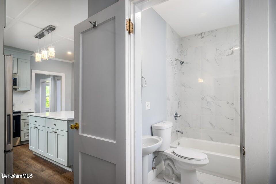 74 Washington Avenue North Adams, MA 01247 - Photo 14 of 31 a bathroom with a toilet a sink and bathtub