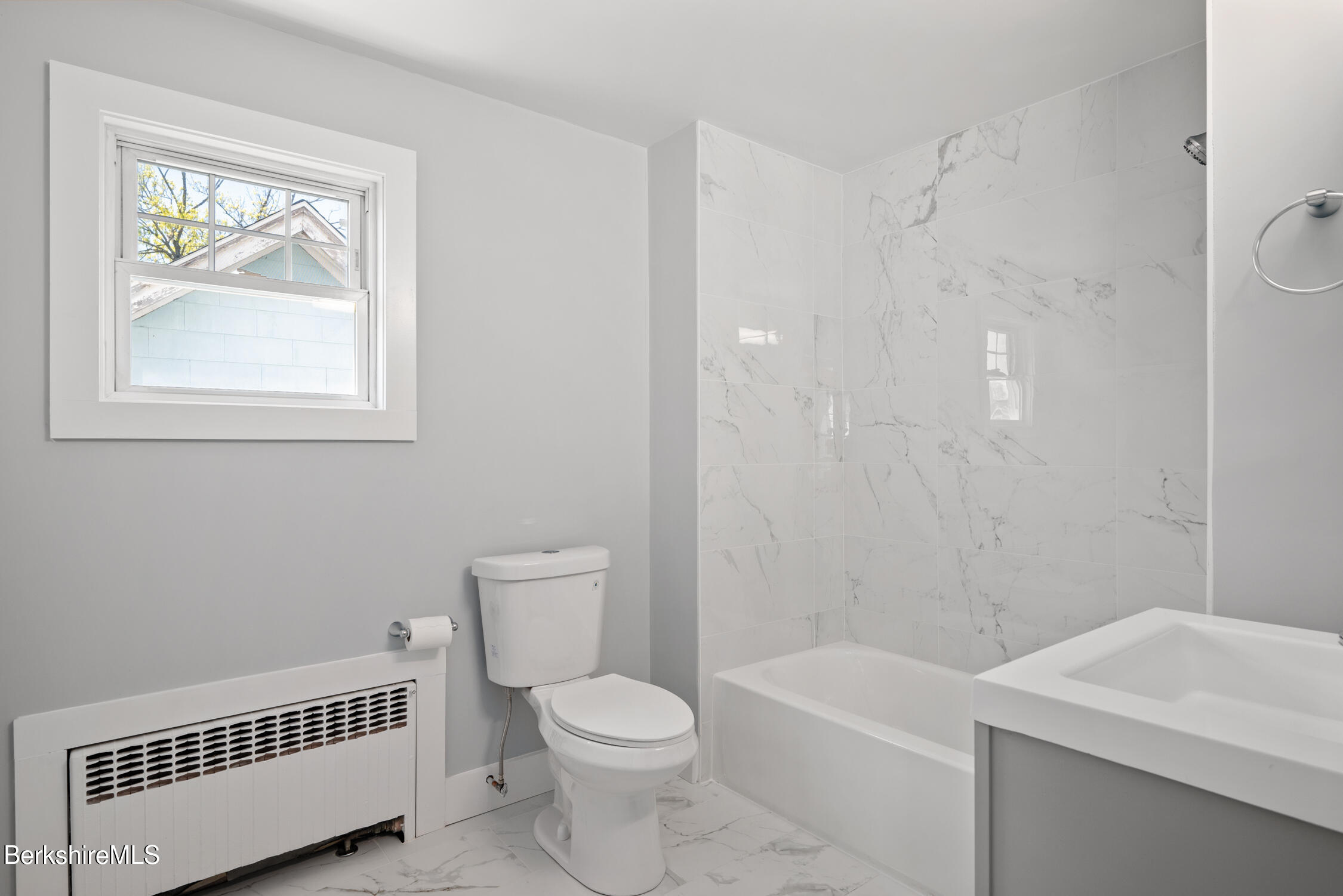 74 Washington Avenue North Adams, MA 01247 - Photo 18 of 31 a bathroom with a toilet a sink and bathtub