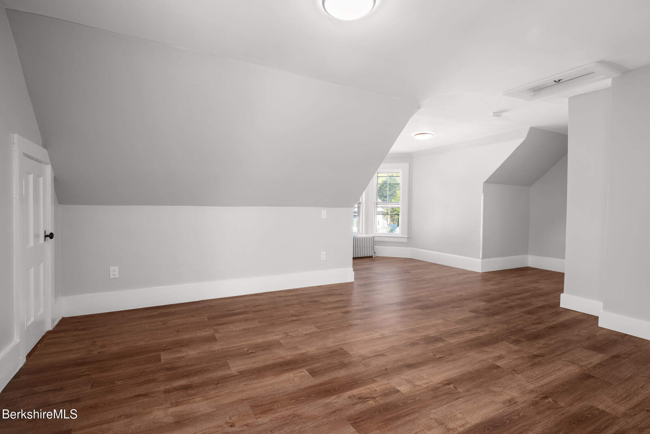 74 Washington Avenue North Adams, MA 01247 - Photo 24 of 31 a view of an empty room with wooden floor