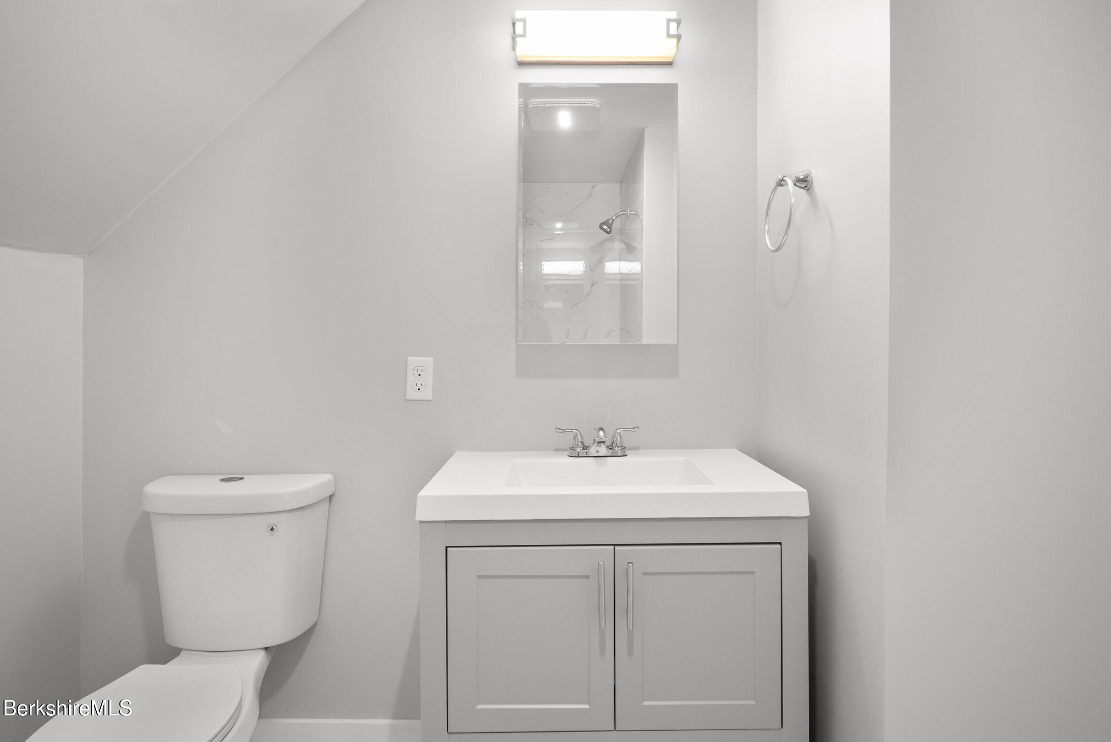 74 Washington Avenue North Adams, MA 01247 - Photo 27 of 31 a bathroom with a toilet sink and mirror