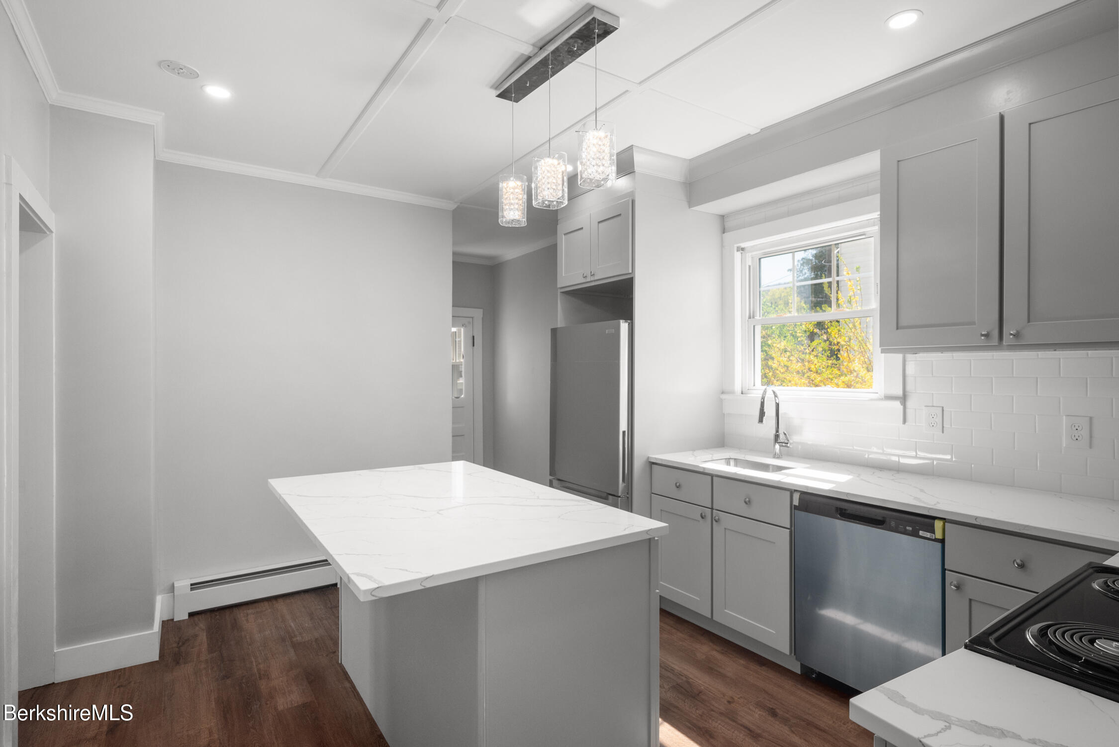 74 Washington Avenue North Adams, MA 01247 - Photo 5 of 31 a kitchen with a sink and a refrigerator