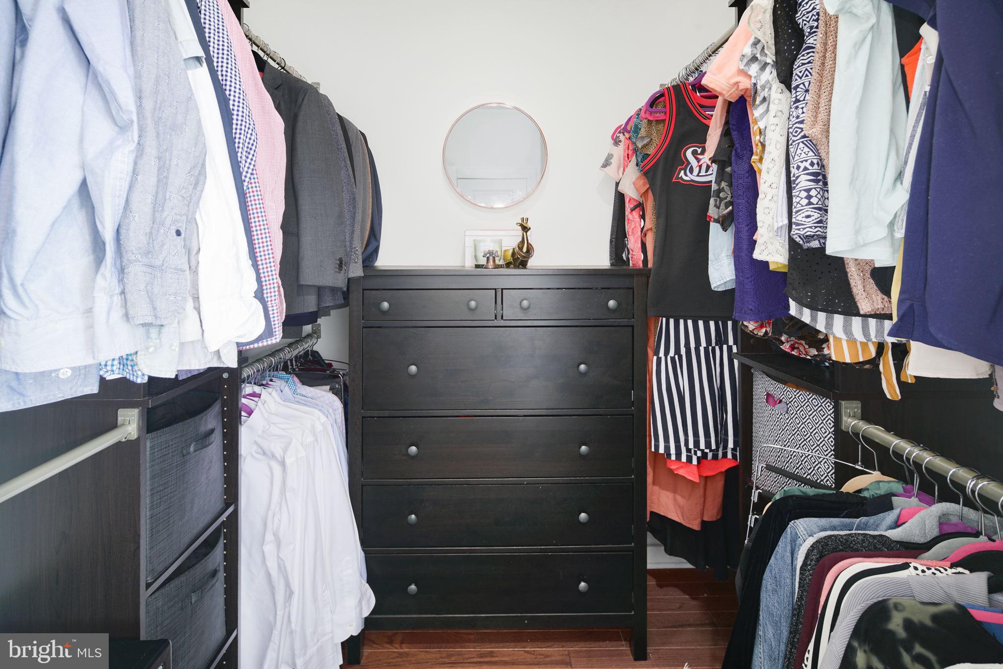 159 East Allen Street, Unit 1 Philadelphia, PA 19125 - Photo 34 of 45 a view of walk in closet with clothes and shoes