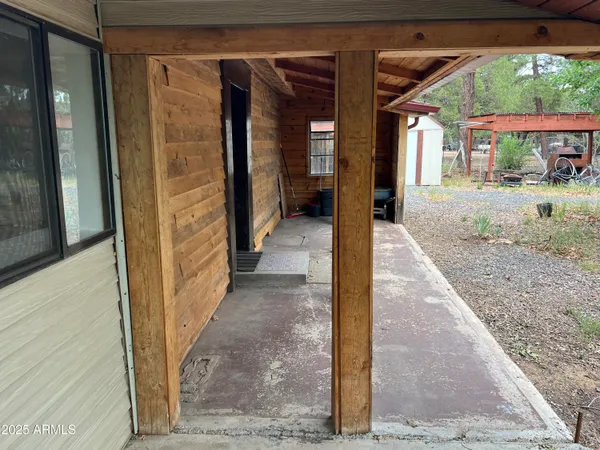 a view of a hallway with a patio
