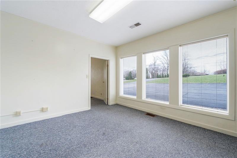 3030 Wilmington Road New Castle, PA 16105 - Photo 27 of 41 an empty room with windows
