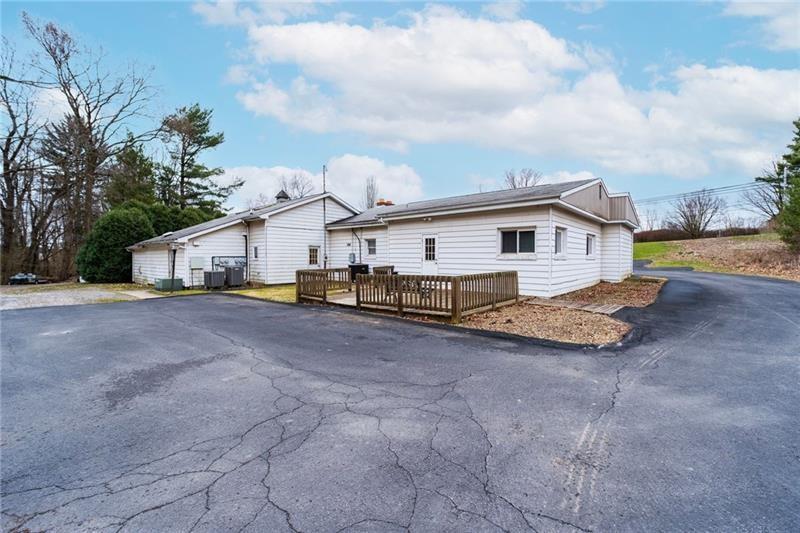 3030 Wilmington Road New Castle, PA 16105 - Photo 39 of 41 a view of a house with backyard and roof
