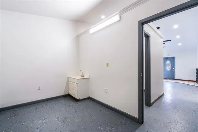 a view of a storage & utility room with closet