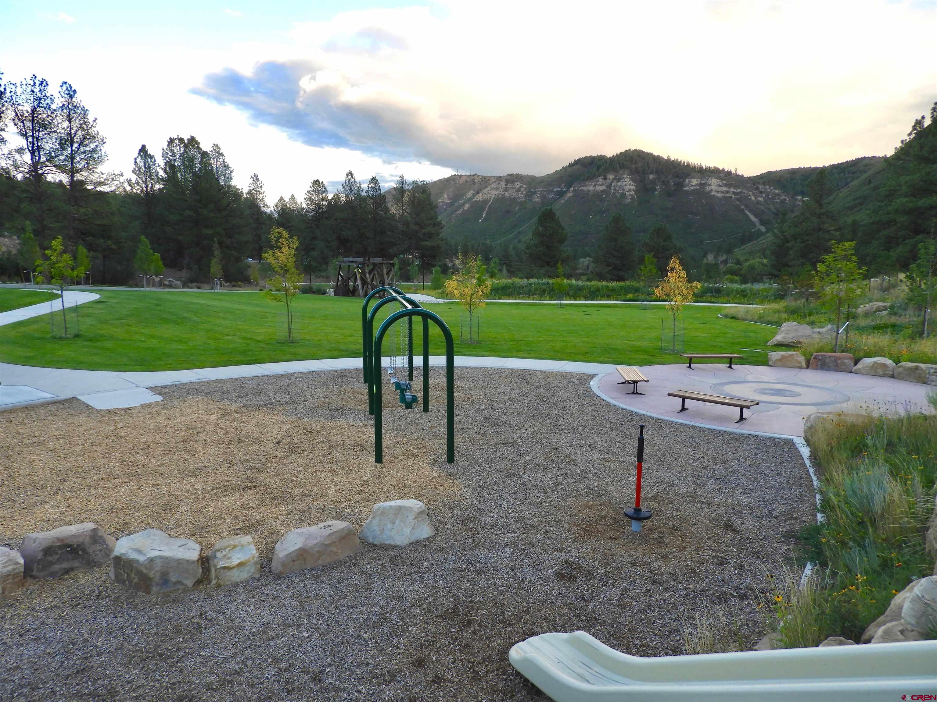 63 Snowdrop Court Durango, CO 81301 - Photo 6 of 17 a view of a table and chairs in the patio