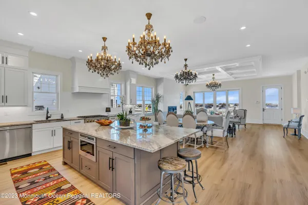 a very nice looking dining room with a table and chairs