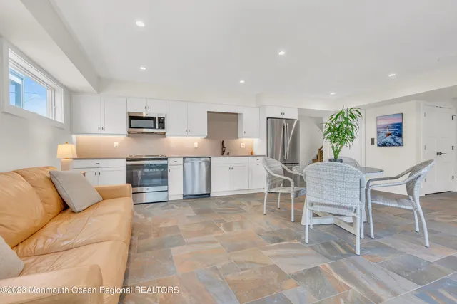 a living room with furniture and a table