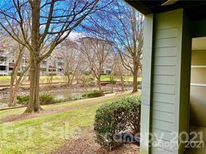 19831 Henderson Road, Unit A Cornelius, NC 28031 - Photo 13 of 15 a view of back yard of the house