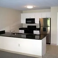 a utility room with a fan