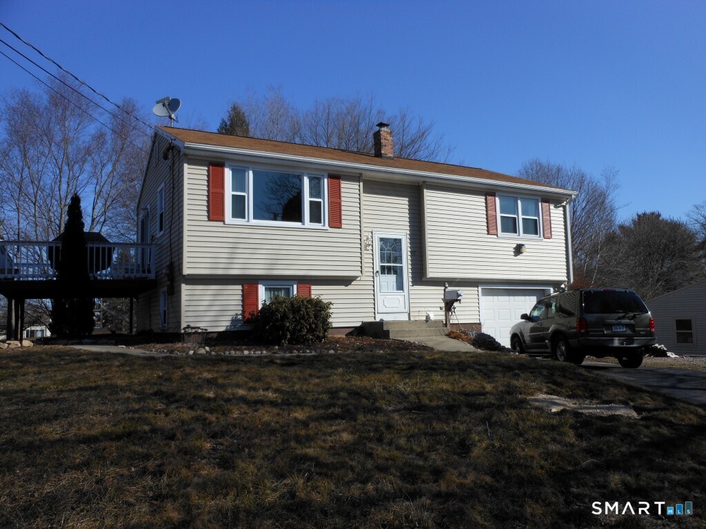 151 Lamphere Road Groton, CT 06355 - Photo 1 of 1 a front view of a house with a yard