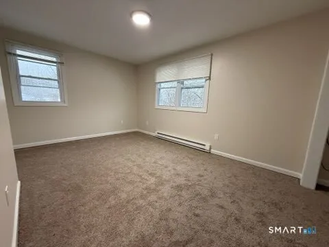 an empty room with windows
