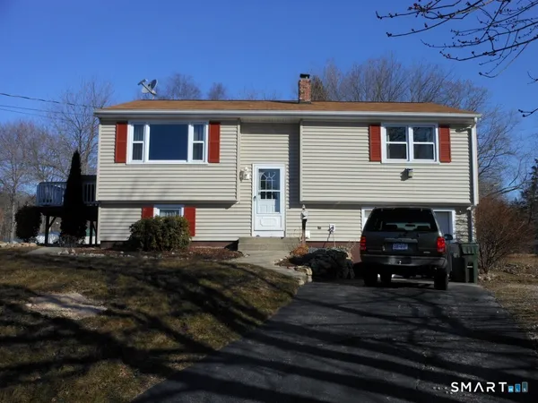 a car parked in front of a house