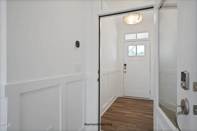 a view of a livingroom with wooden floor