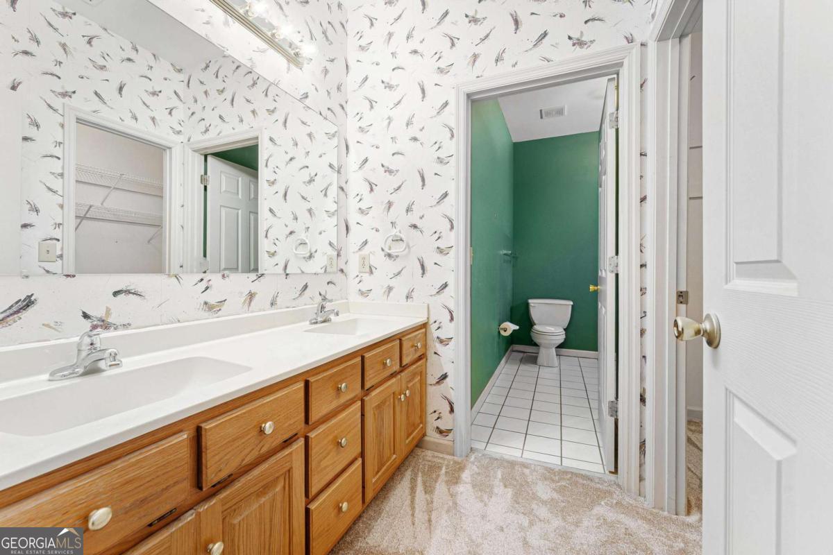 6270 Old Jefferson Road Athens, GA 30607 - Photo 16 of 33 a spacious bathroom with a sink and mirror