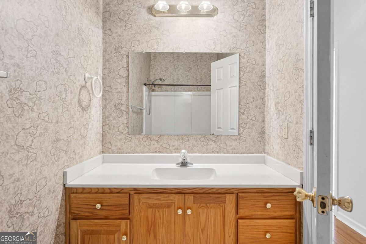 6270 Old Jefferson Road Athens, GA 30607 - Photo 21 of 33 a bathroom with a sink and a mirror