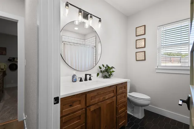 a kitchen with stainless steel appliances a refrigerator and a stove