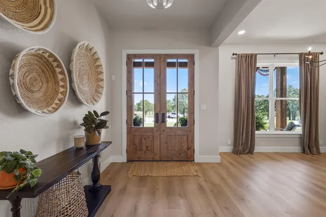 a view of a room with furniture and garden view