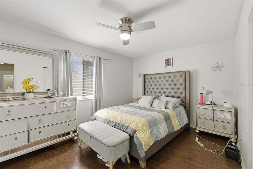 1939 Southwest 73rd Terrace Gainesville, FL 32607 - Photo 14 of 26 a bedroom with a bed and window