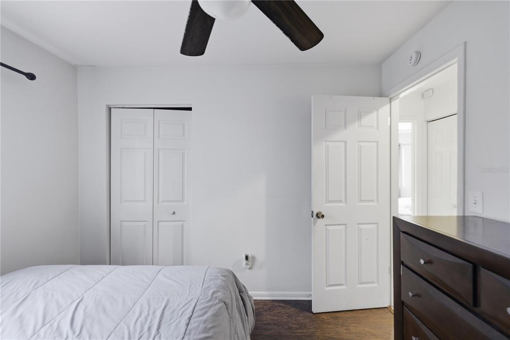 1939 Southwest 73rd Terrace Gainesville, FL 32607 - Photo 22 of 26 a bedroom with a bed and a window