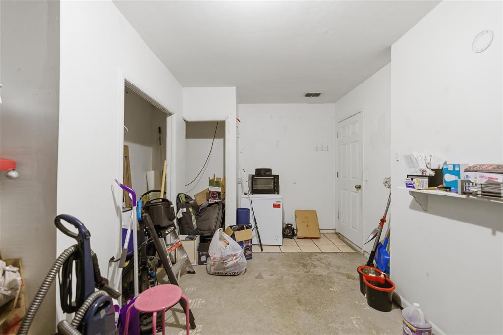 1939 Southwest 73rd Terrace Gainesville, FL 32607 - Photo 23 of 26 a view of a room with gym equipment