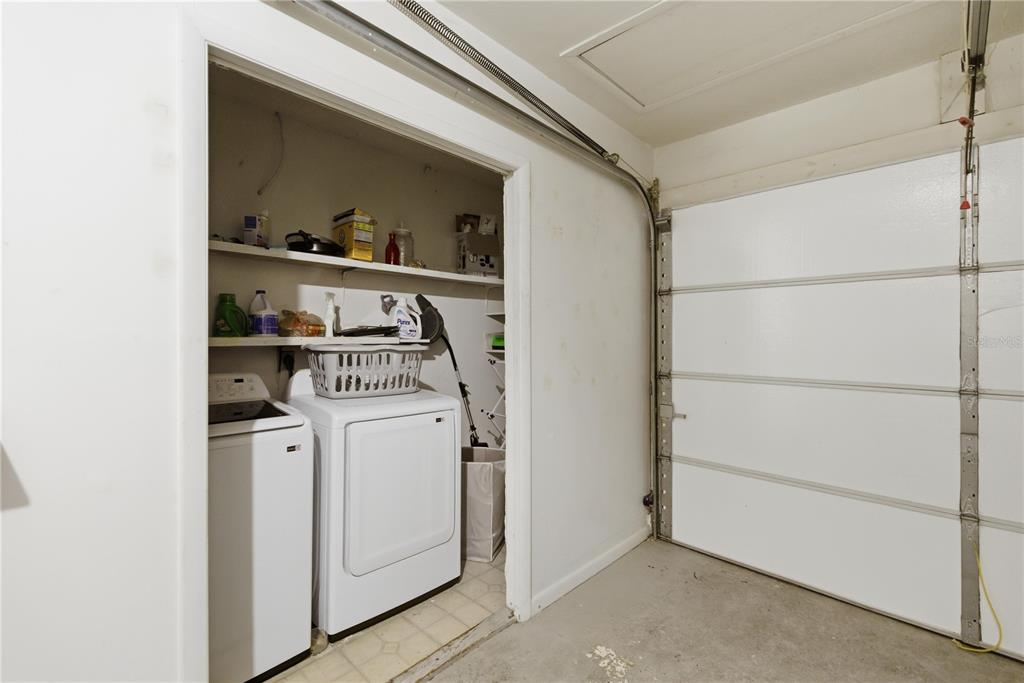 1939 Southwest 73rd Terrace Gainesville, FL 32607 - Photo 24 of 26 a utility room with dryer and washer