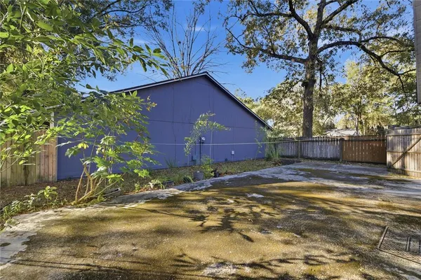 a backyard of a house with lots of green space