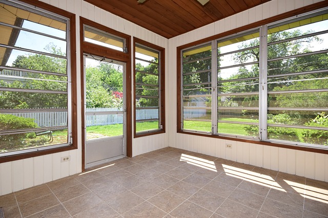 237 Blackhawk Road Riverside, IL 60546 - Photo 20 of 23 a view of an empty room with wooden floor and a large window