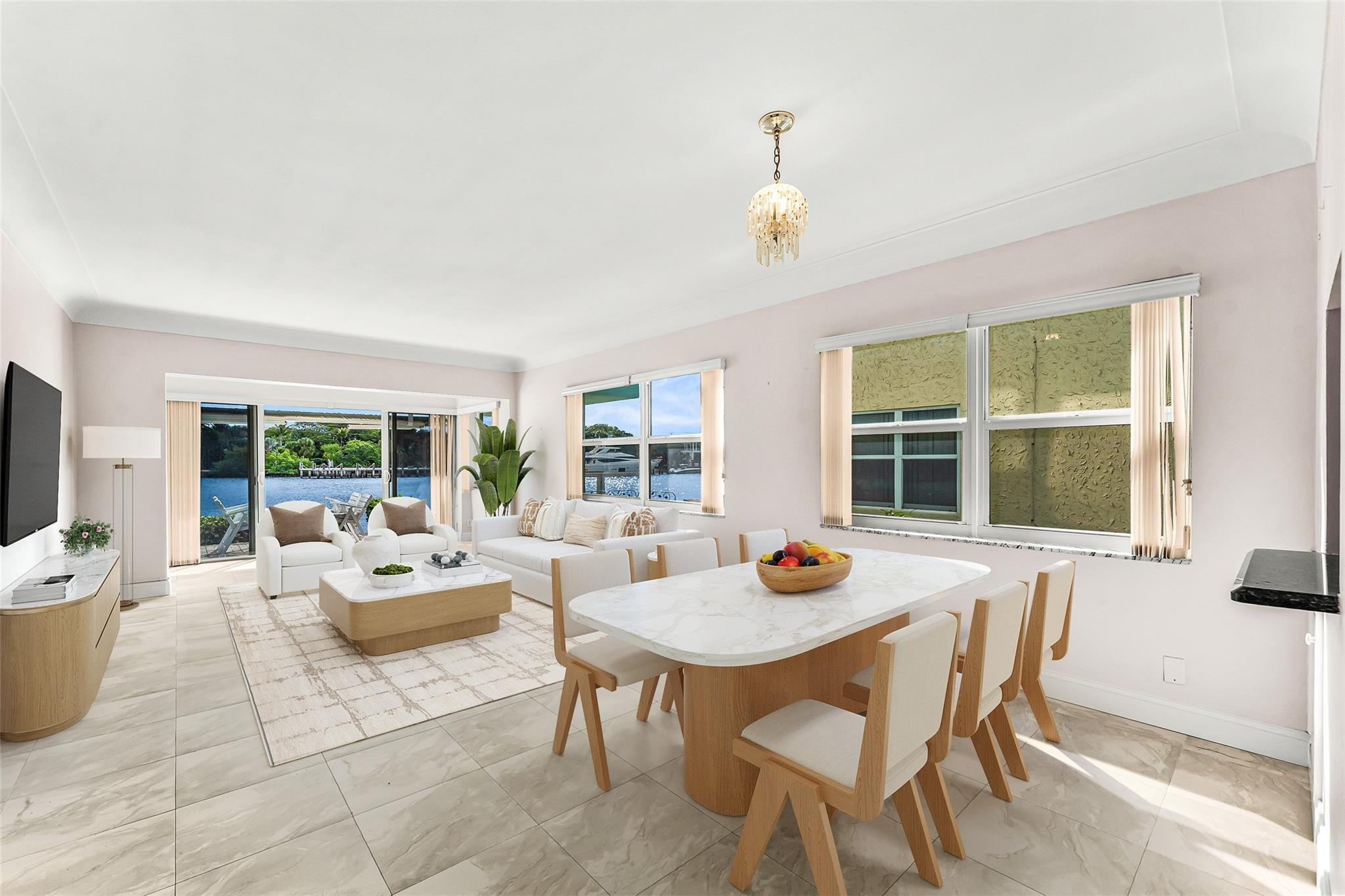 2758 Northeast 30th Avenue, Unit 1A Lighthouse Point, FL 33064 - Photo 11 of 48 a view of a dining room with furniture window and outside view