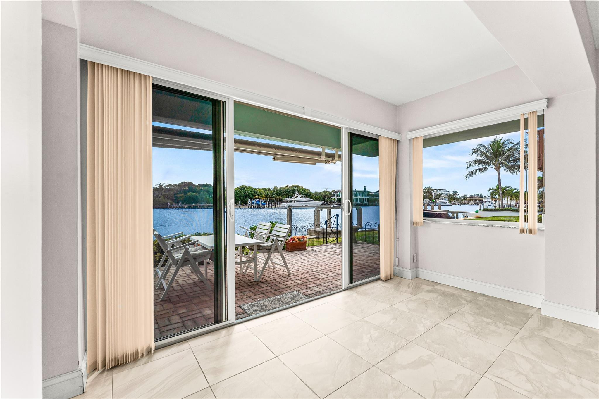 2758 Northeast 30th Avenue, Unit 1A Lighthouse Point, FL 33064 - Photo 32 of 48 a view of a room with a large window