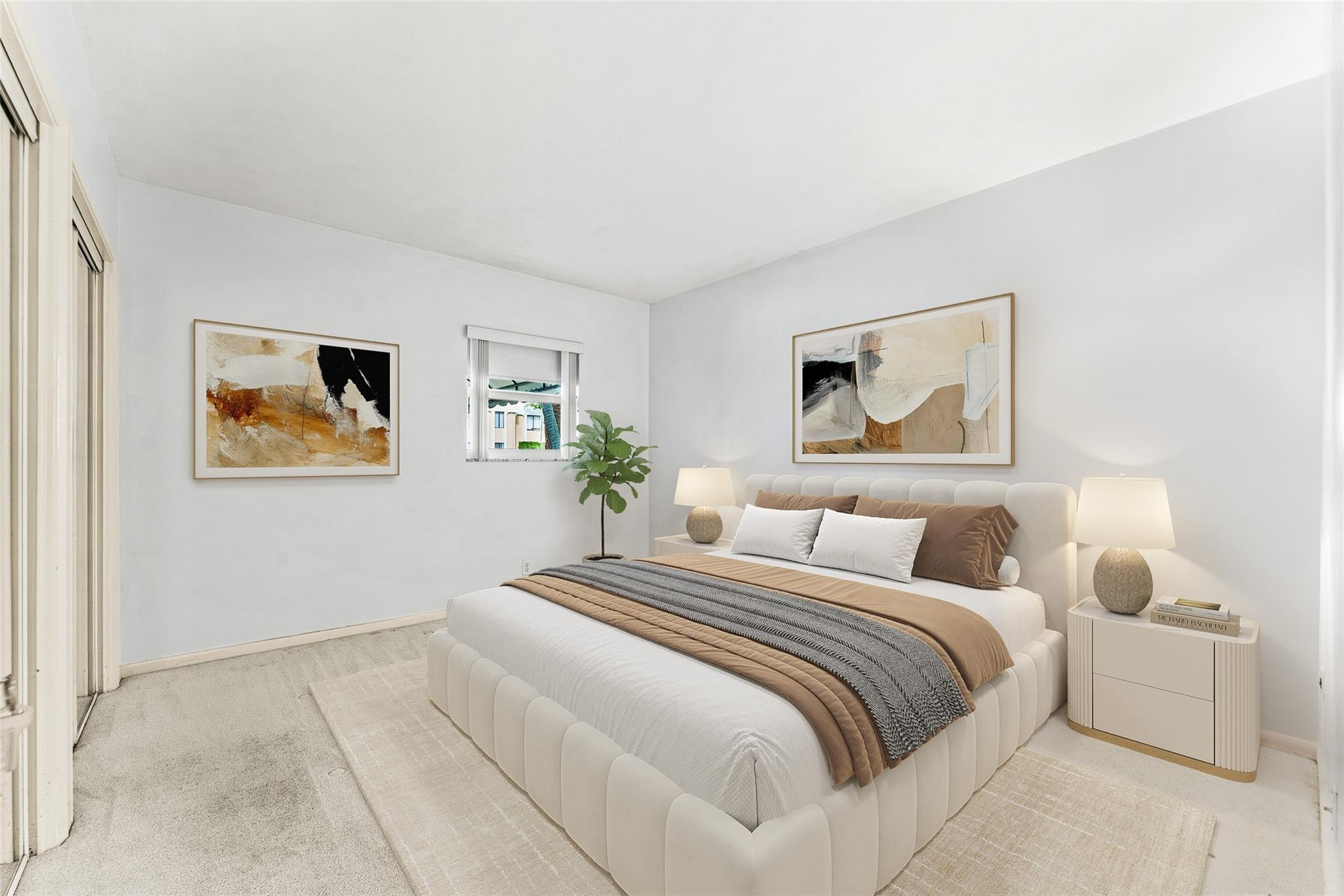 2758 Northeast 30th Avenue, Unit 1A Lighthouse Point, FL 33064 - Photo 37 of 48 a bedroom with a bed and a painting on the wall