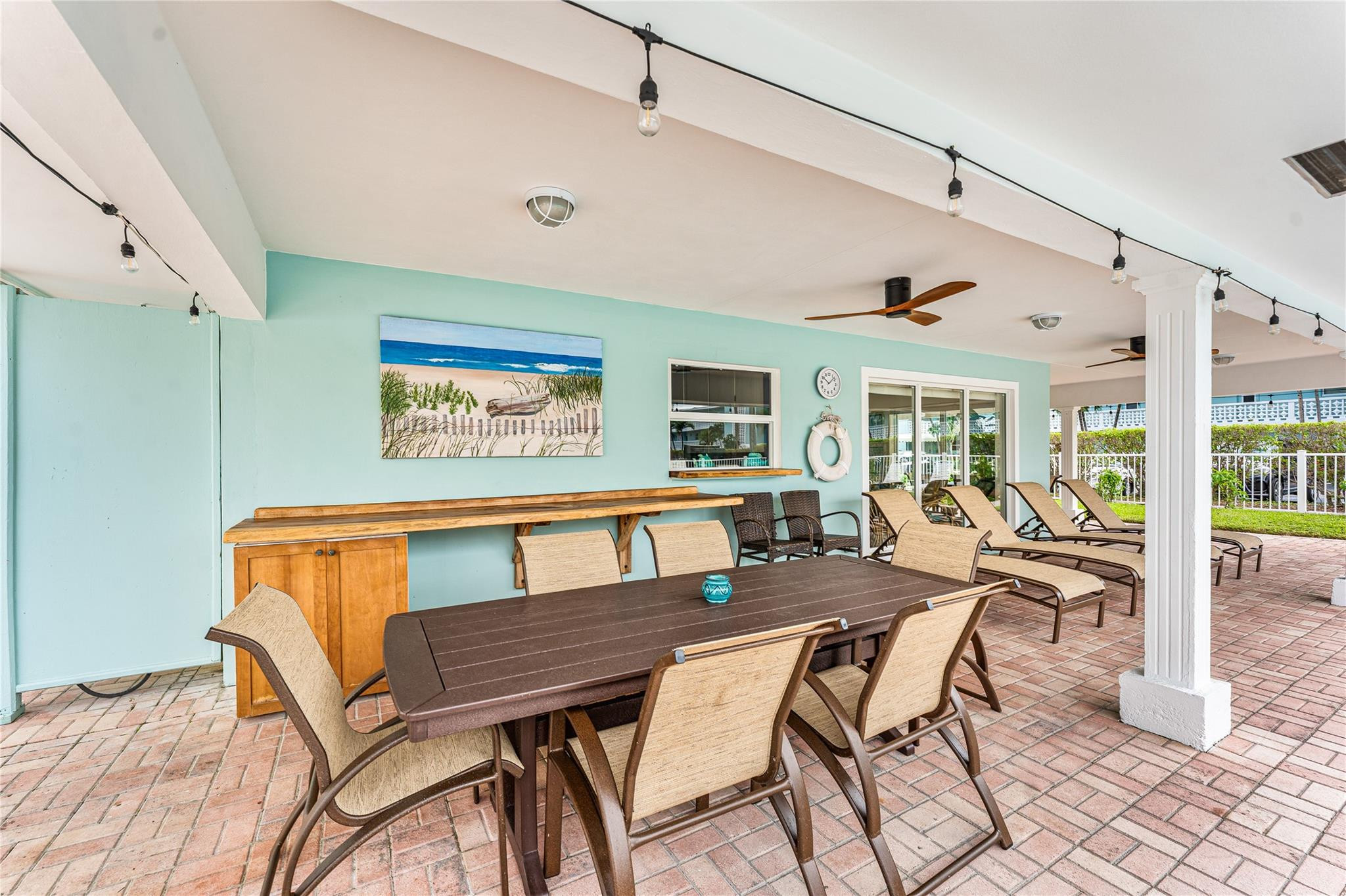 2758 Northeast 30th Avenue, Unit 1A Lighthouse Point, FL 33064 - Photo 45 of 48 a dining room with furniture and wooden floor