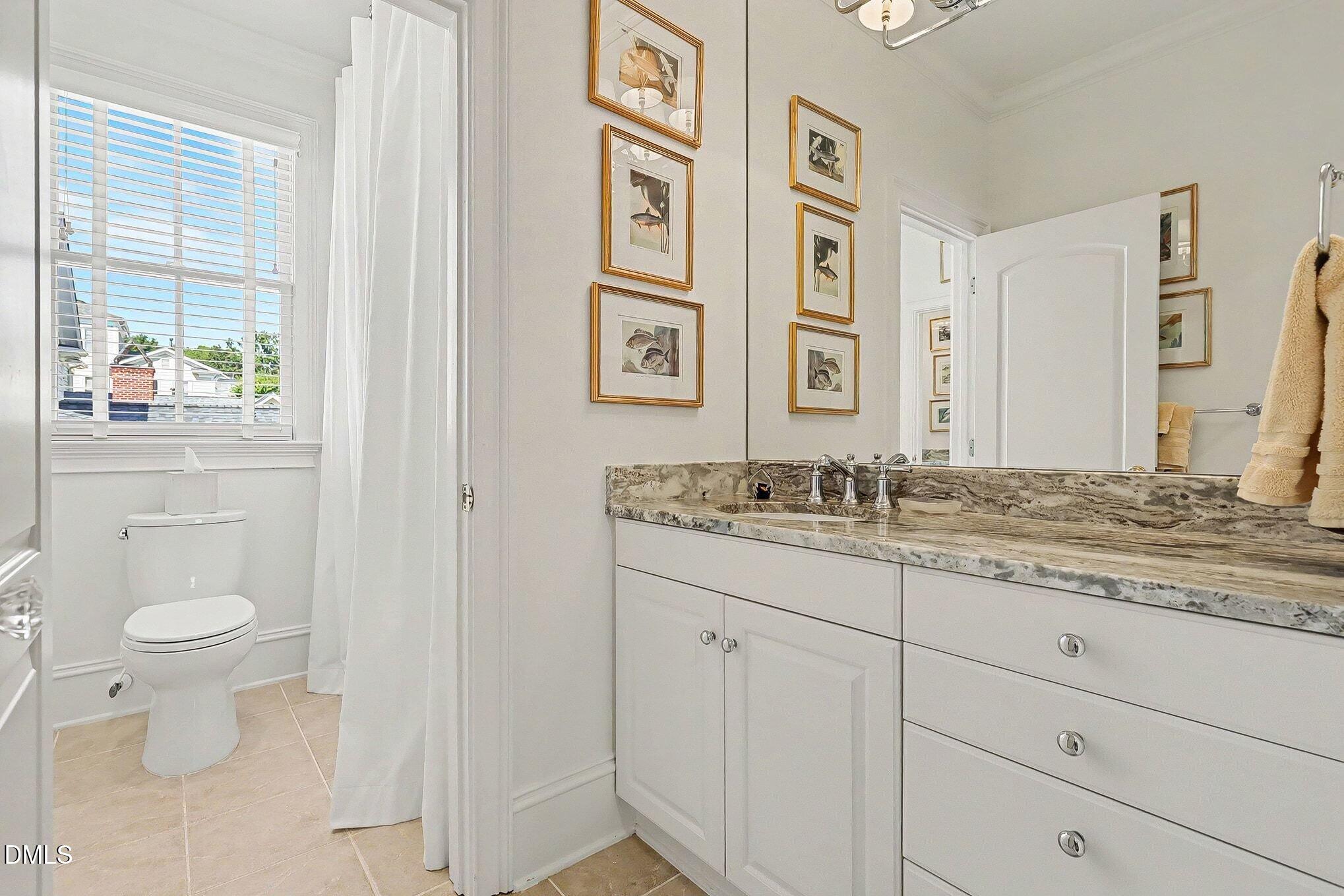 8512 Society Place Raleigh, NC 27615 - Photo 42 of 56 You really need to see the beautiful Baths in person.