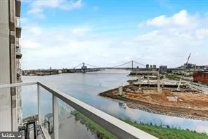 a view of a lake with a large bridge