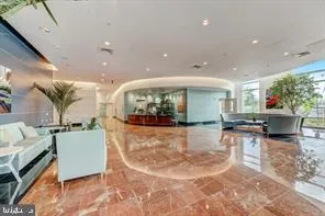 a view of a living room and kitchen