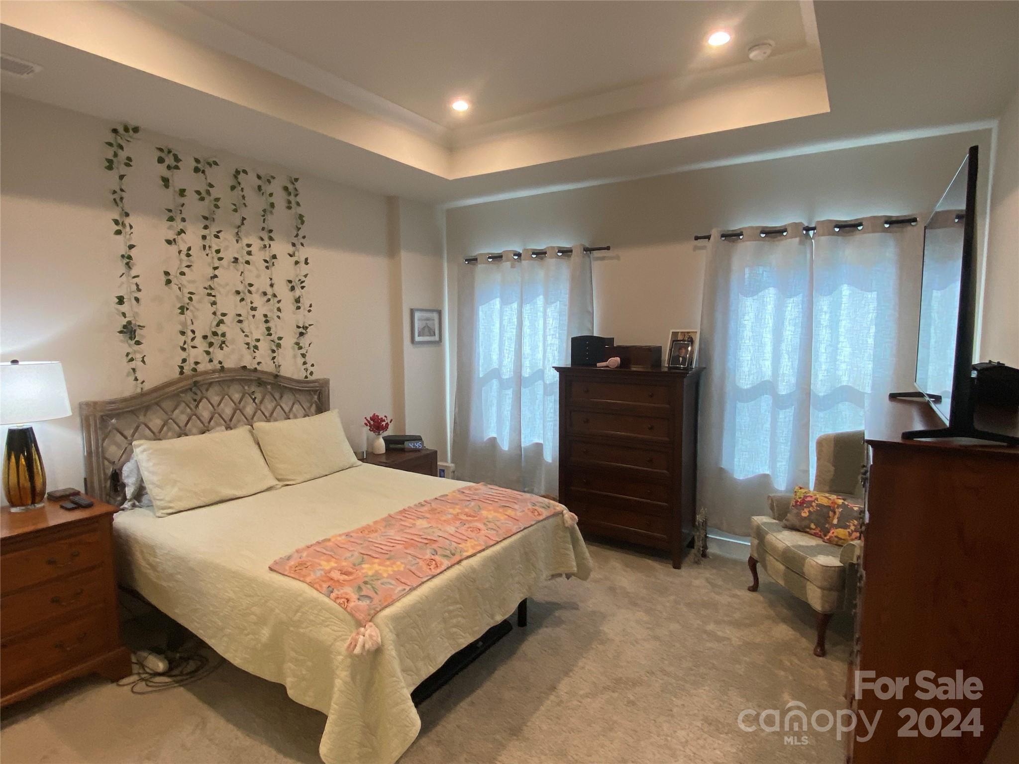 765 Hazel Way Denver, NC 28037 - Photo 14 of 35 a bedroom with a bed and furniture