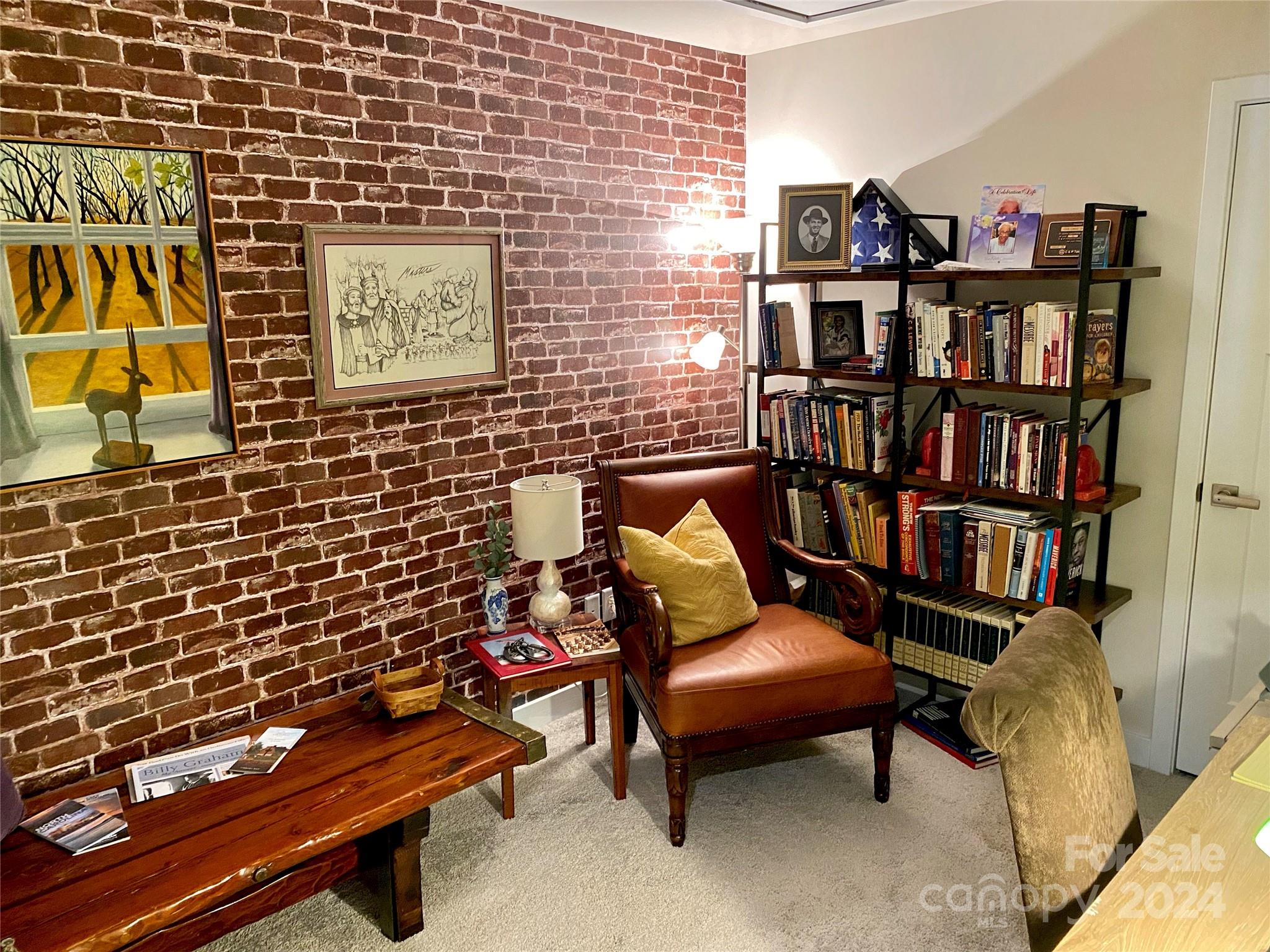 765 Hazel Way Denver, NC 28037 - Photo 23 of 35 a reading room with furniture and book shelf