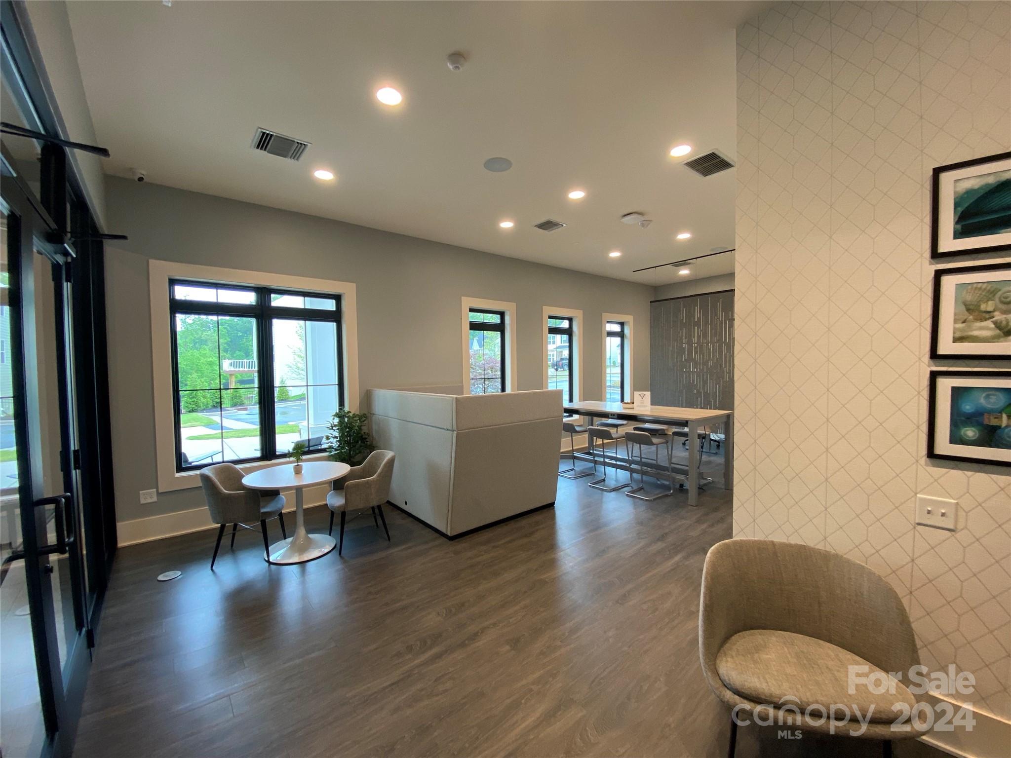765 Hazel Way Denver, NC 28037 - Photo 25 of 35 a living room with furniture and a wooden floor
