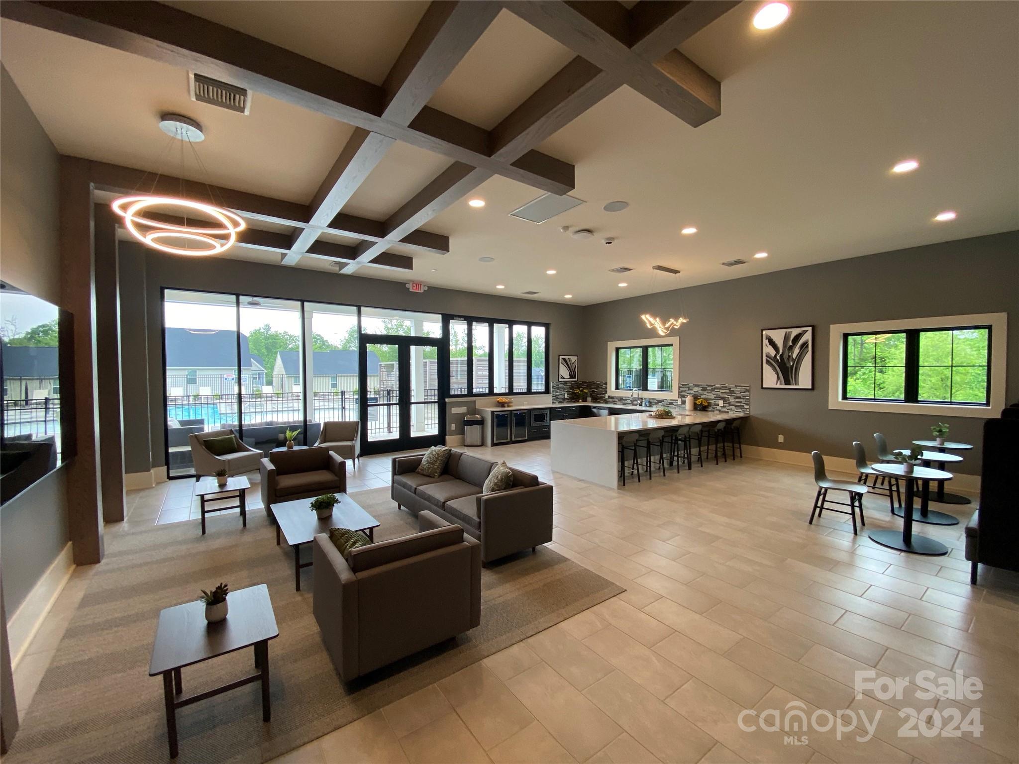 765 Hazel Way Denver, NC 28037 - Photo 32 of 35 a living room with furniture and a large window
