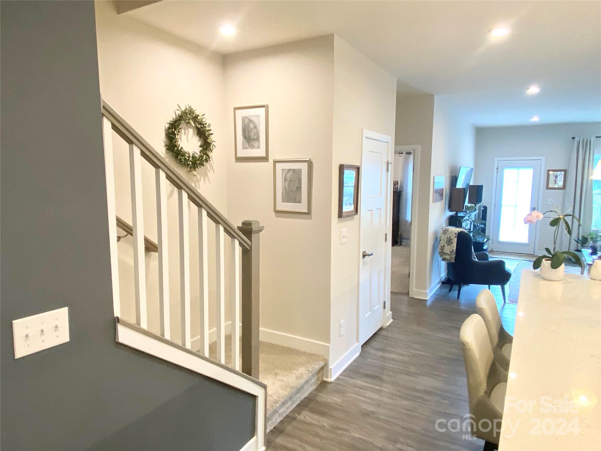 765 Hazel Way Denver, NC 28037 - Photo 5 of 35 a view of a livingroom with furniture and stairs