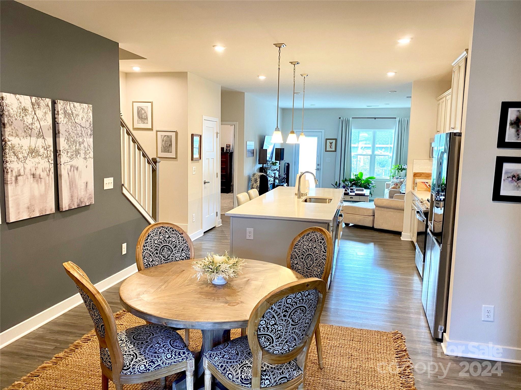 765 Hazel Way Denver, NC 28037 - Photo 9 of 35 a view of a dining room with furniture