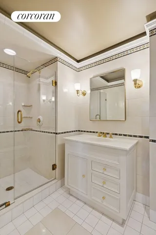 a bathroom with a shower and a sink